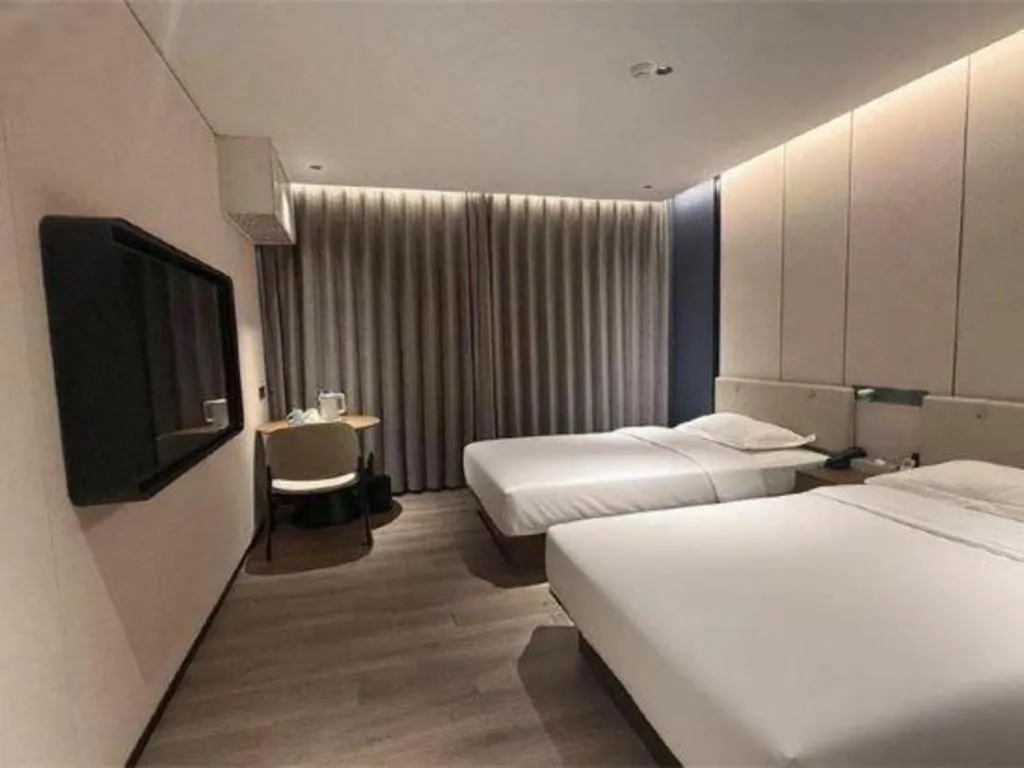 Bed in GreenTree Inn Guangzhou Panyu Bus Station Business Hotel