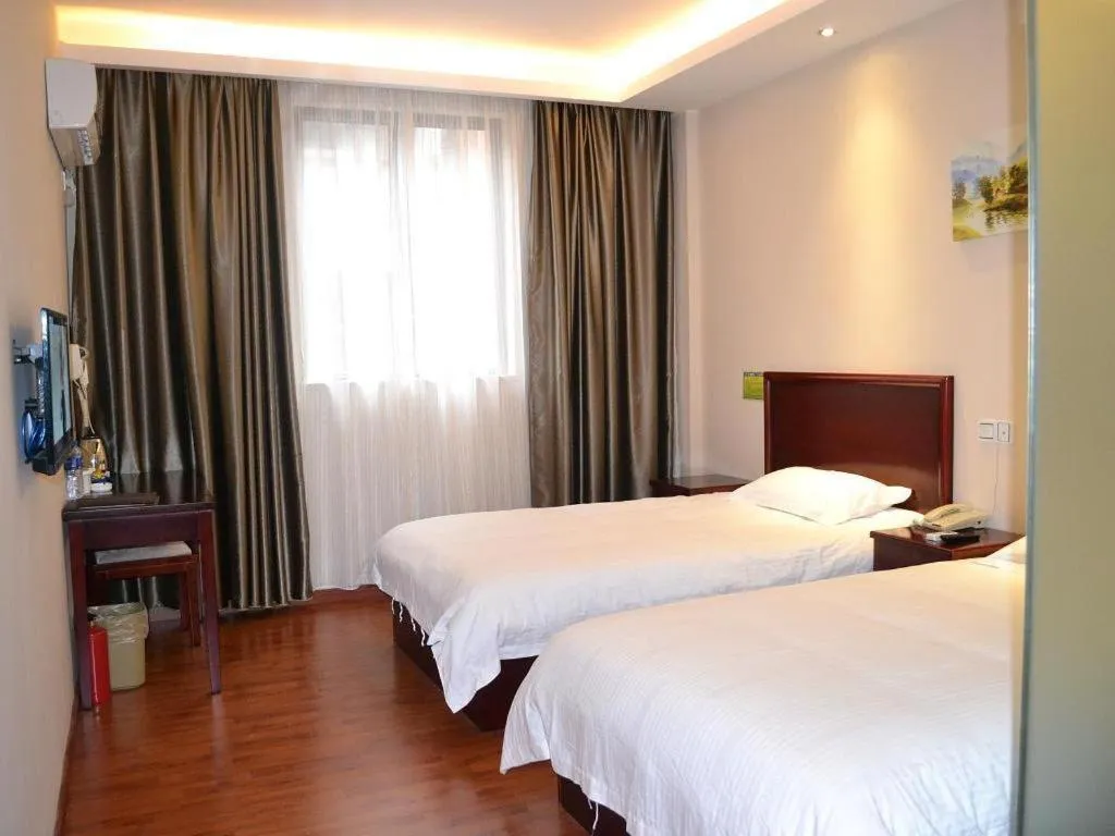 Bed in GreenTree Inn Guangzhou Panyu Bus Station Business Hotel