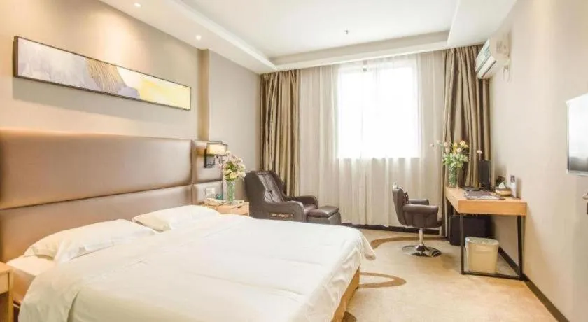 Bed in GreenTree Inn Guangzhou Panyu Bus Station Business Hotel