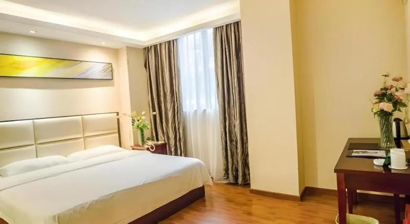 Bed in GreenTree Inn Guangzhou Panyu Bus Station Business Hotel