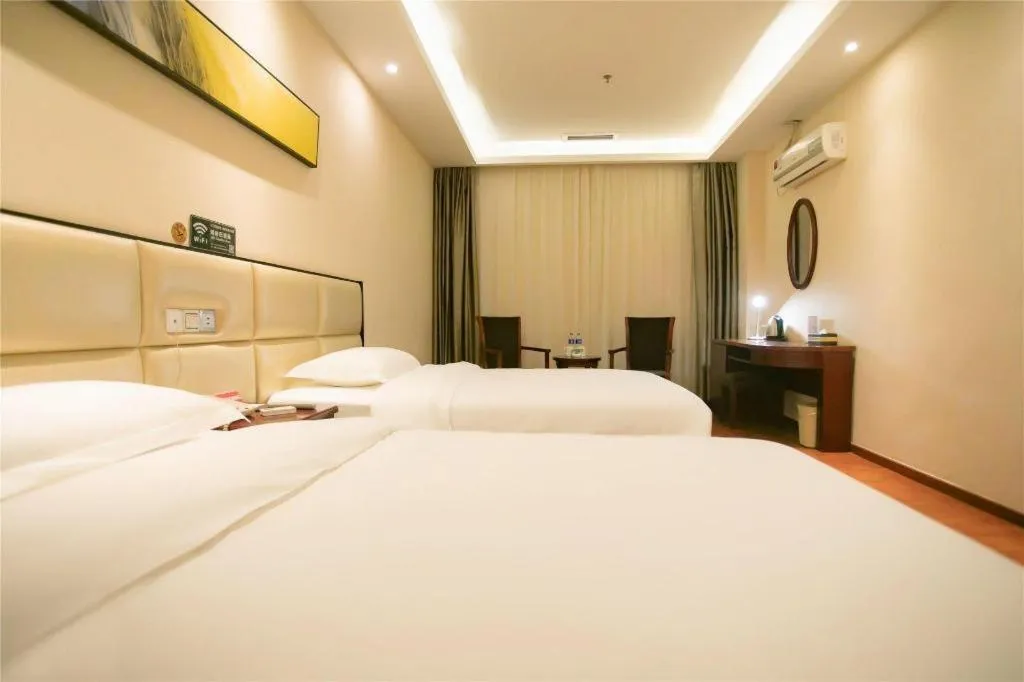 Bed in GreenTree Inn Guangzhou Panyu Bus Station Business Hotel