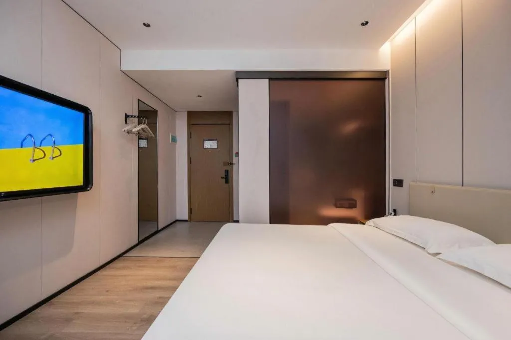 Bed in GreenTree Inn Guangzhou Panyu Bus Station Business Hotel