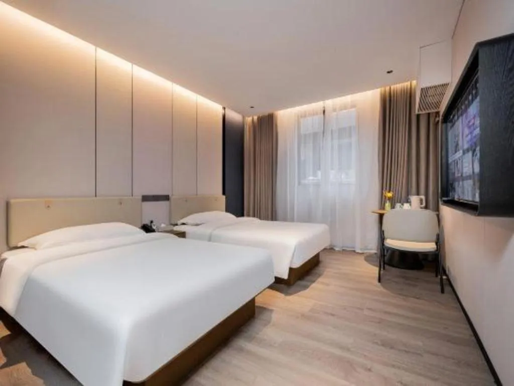 Bed in GreenTree Inn Guangzhou Panyu Bus Station Business Hotel