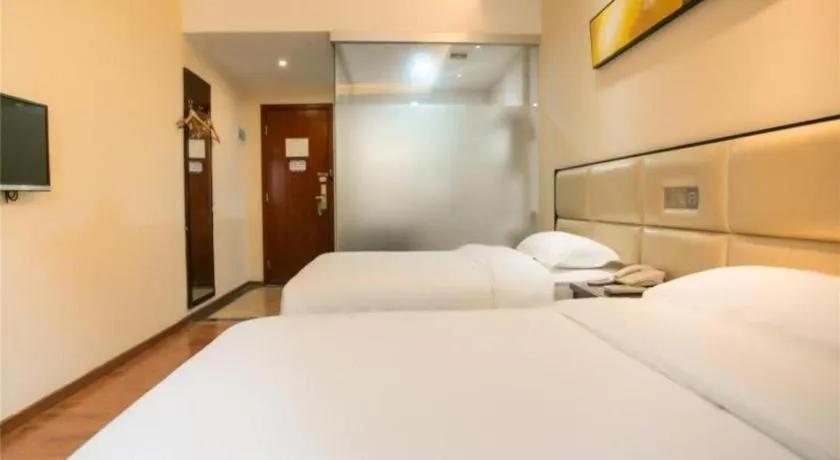 Bed in GreenTree Inn Guangzhou Panyu Bus Station Business Hotel