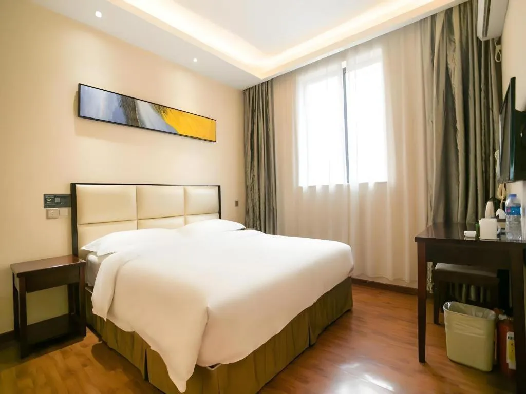 Bed in GreenTree Inn Guangzhou Panyu Bus Station Business Hotel