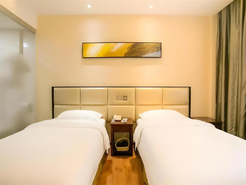 Bed in GreenTree Inn Guangzhou Panyu Bus Station Business Hotel