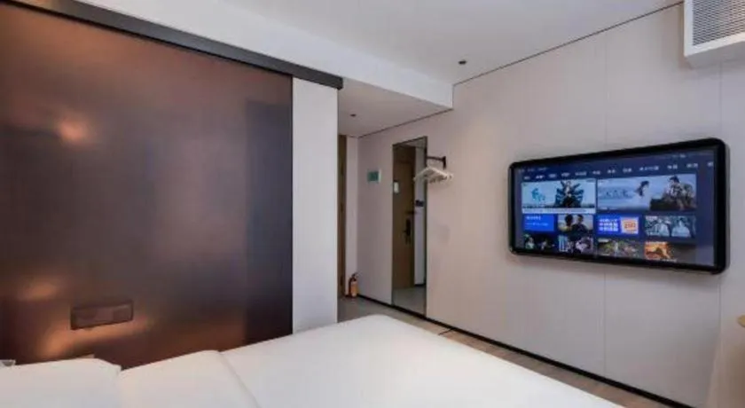 Bed in GreenTree Inn Guangzhou Panyu Bus Station Business Hotel