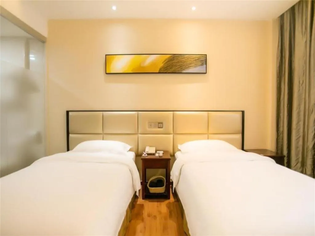 Bed in GreenTree Inn Guangzhou Panyu Bus Station Business Hotel