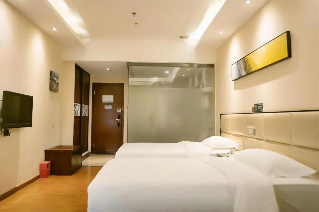 Bed in GreenTree Inn Guangzhou Panyu Bus Station Business Hotel
