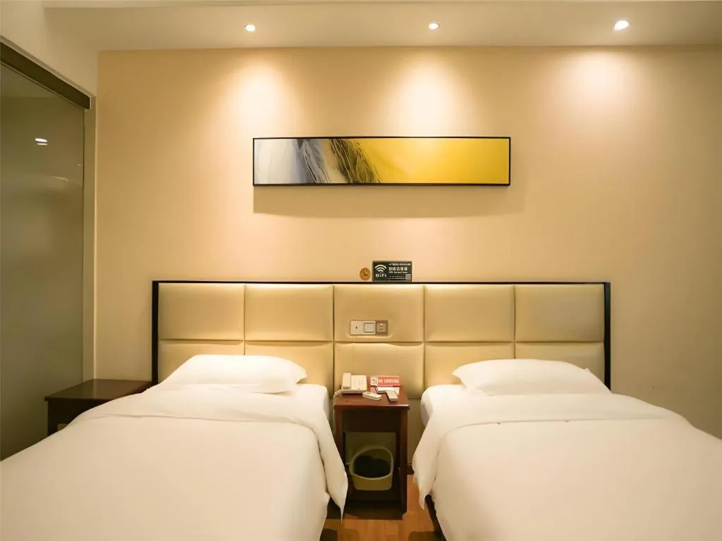 Bed in GreenTree Inn Guangzhou Panyu Bus Station Business Hotel