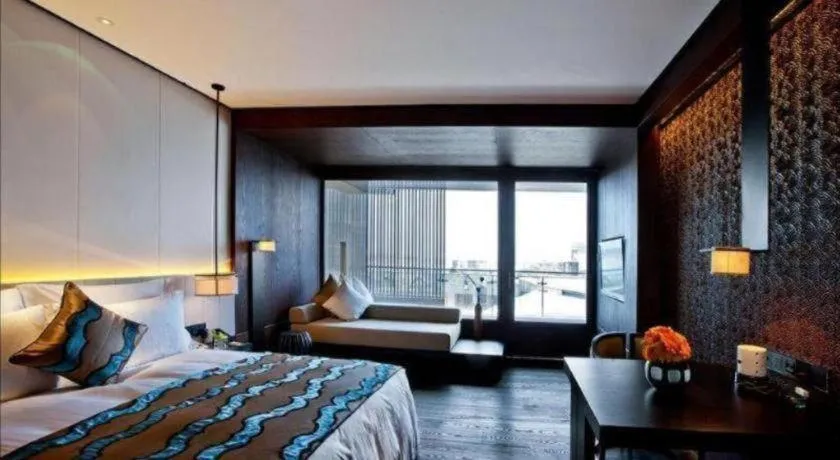 Bed in OCT Bay Breeze Hotel