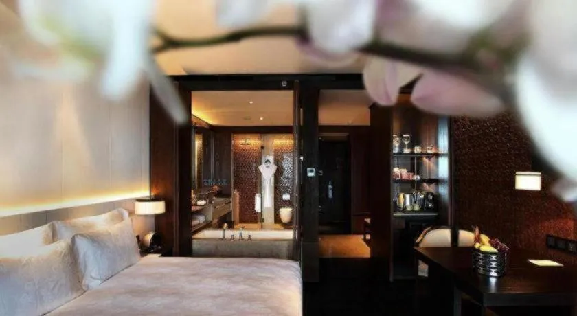 Bed in OCT Bay Breeze Hotel