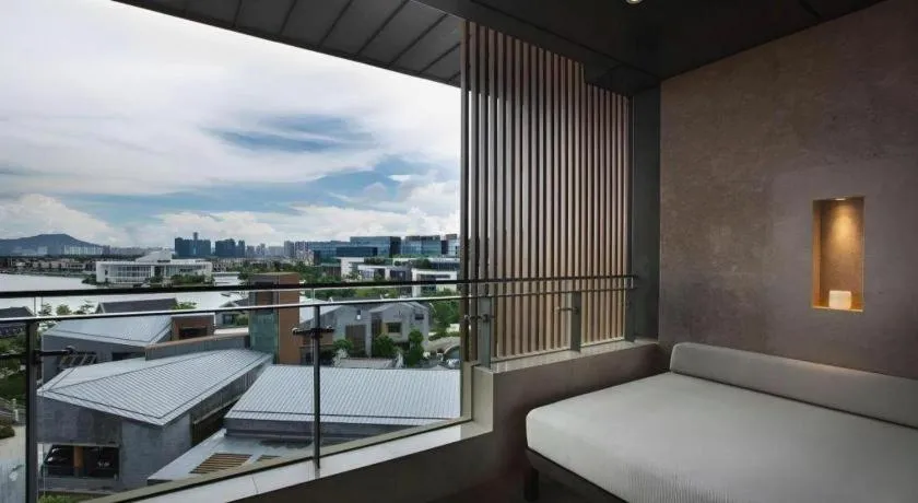 Bed in OCT Bay Breeze Hotel