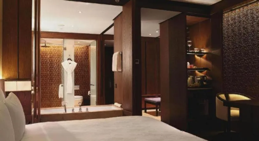 Bed in OCT Bay Breeze Hotel