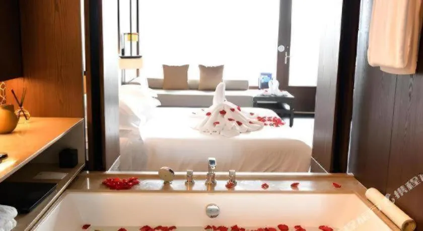 Bed in OCT Bay Breeze Hotel