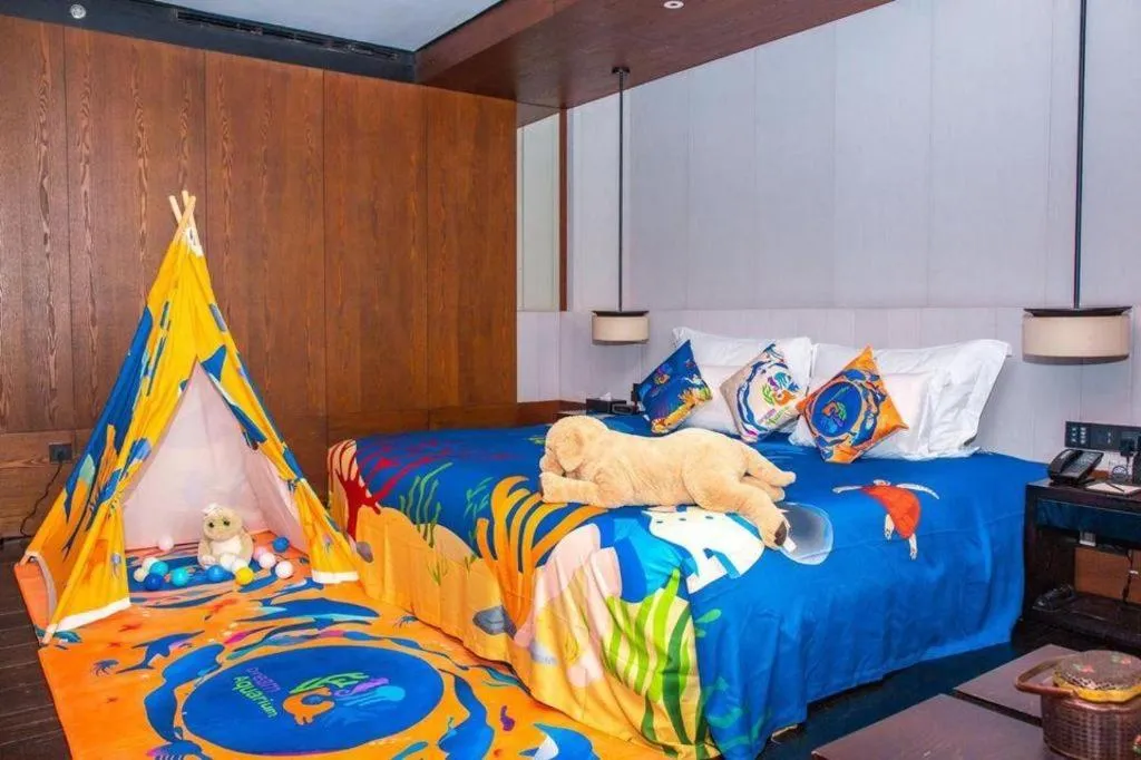 Bed in OCT Bay Breeze Hotel