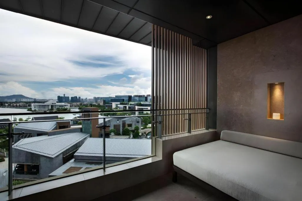 Bed in OCT Bay Breeze Hotel