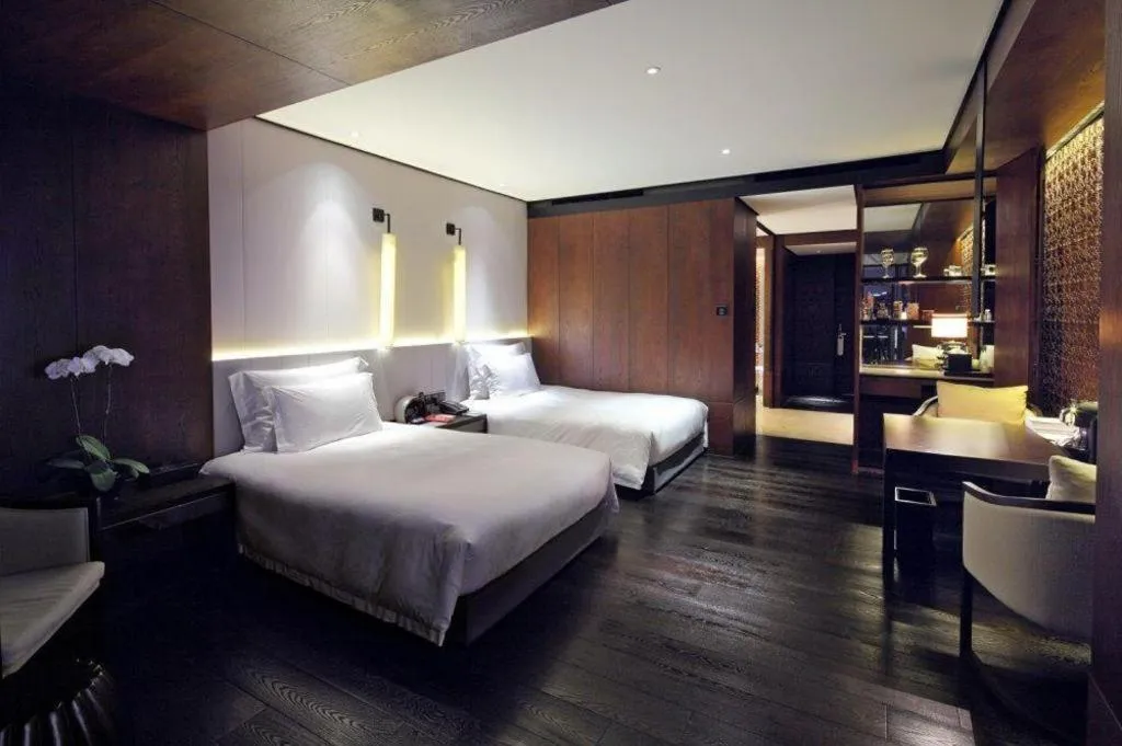 Bed in OCT Bay Breeze Hotel