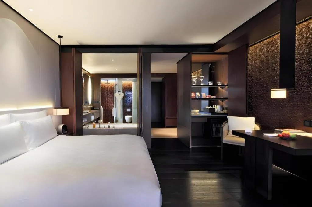 Bed in OCT Bay Breeze Hotel