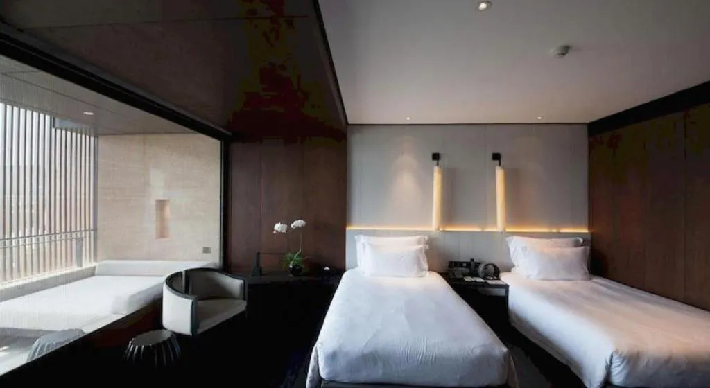 Bed in OCT Bay Breeze Hotel