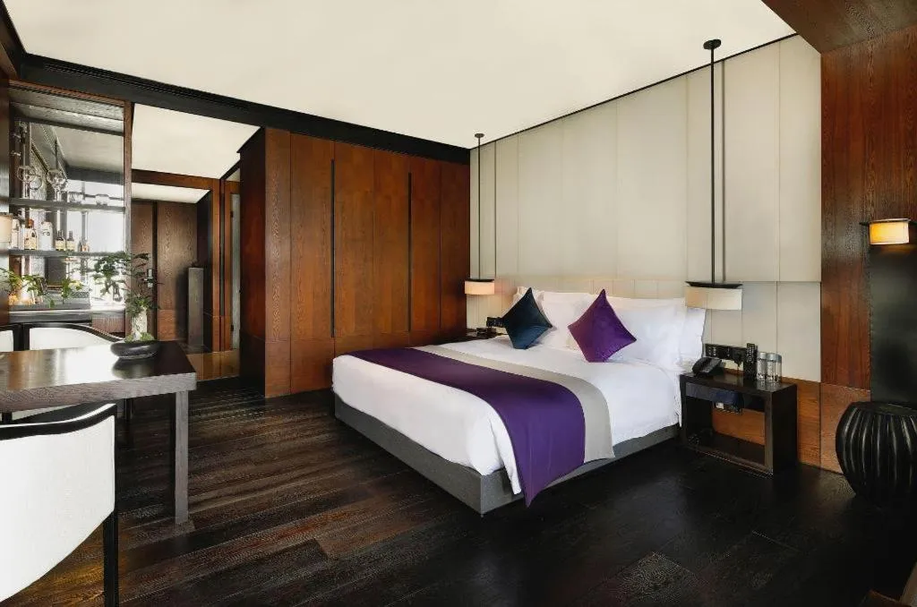 Bed in OCT Bay Breeze Hotel