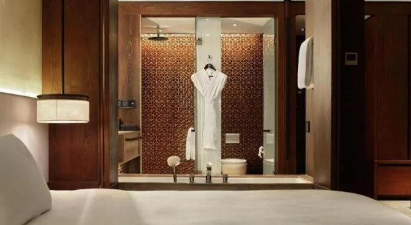 Bed in OCT Bay Breeze Hotel