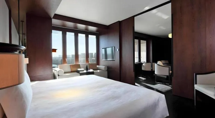 Bed in OCT Bay Breeze Hotel