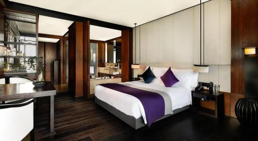 Bed in OCT Bay Breeze Hotel