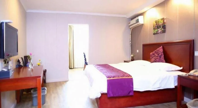 Bed in GreenTree Inn Wuxi Guangrui Road Hotel