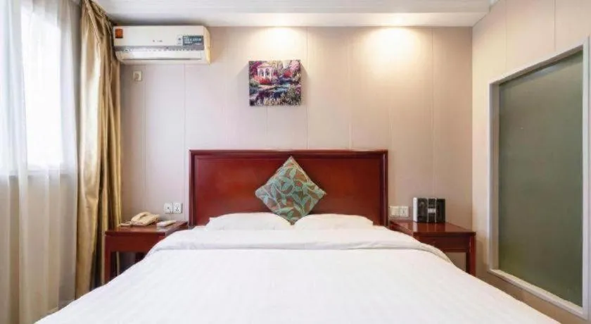 Bed in GreenTree Inn Wuxi Guangrui Road Hotel