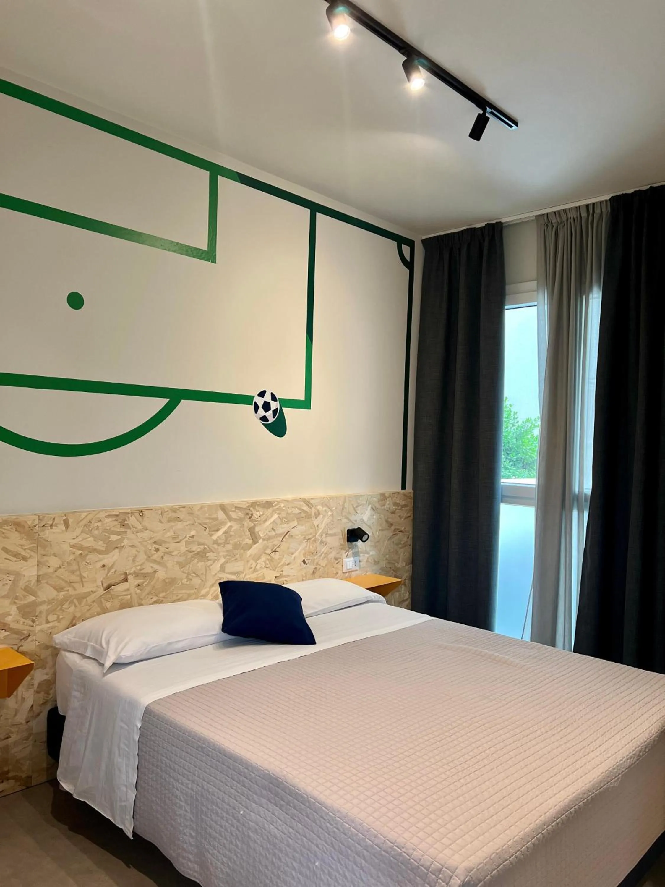 Bed in Fantini Club Hotel