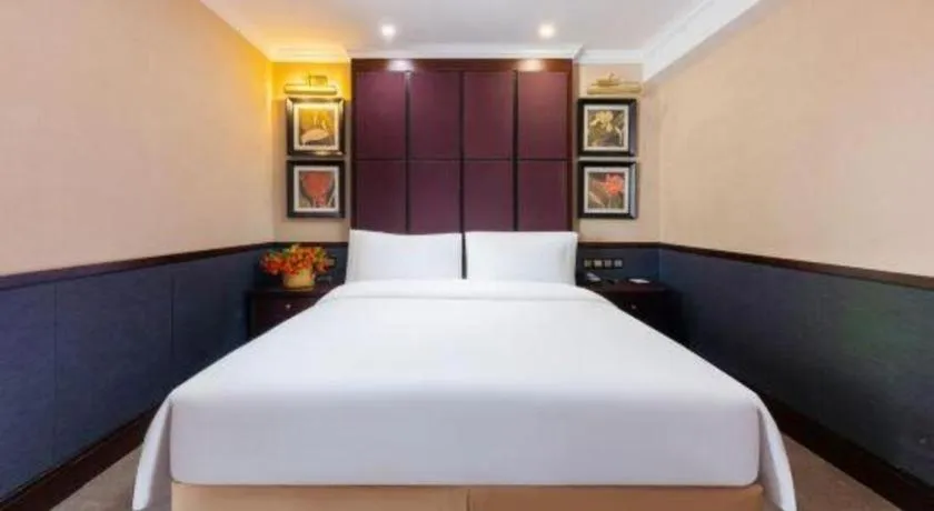 Bed in Grand Skylight Hotel KaiMei