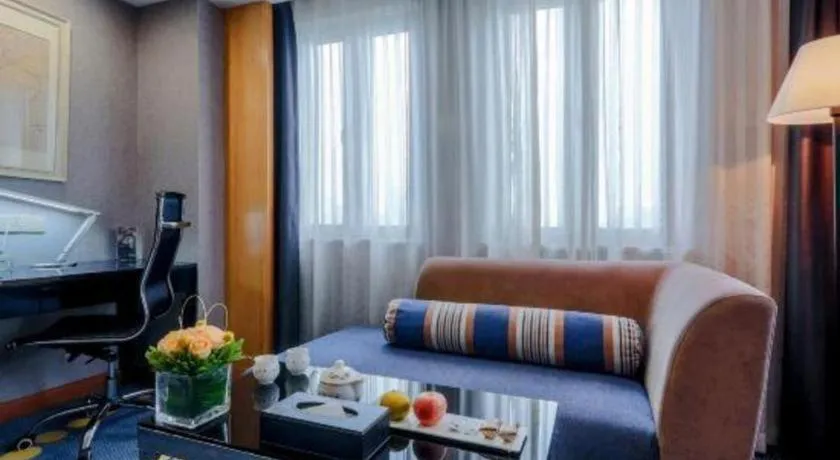 Bed in Grand Skylight Hotel KaiMei