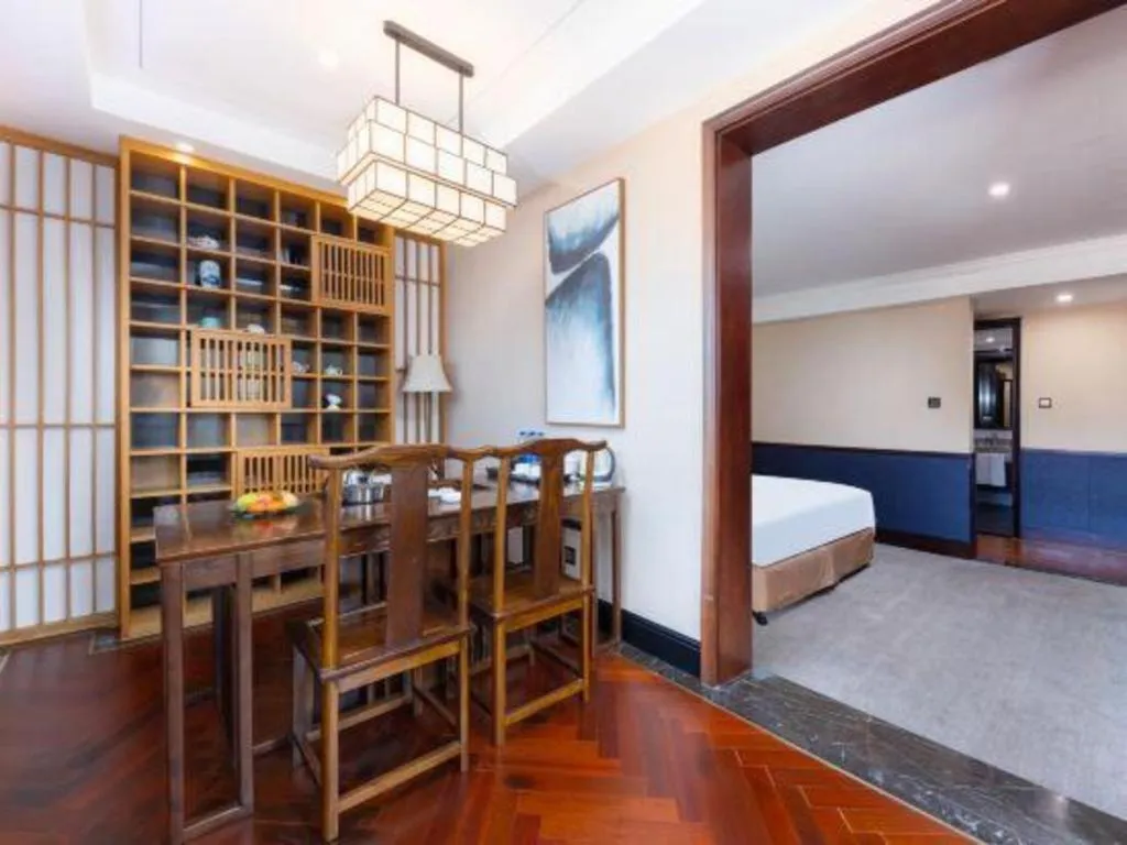 Bed in Grand Skylight Hotel KaiMei