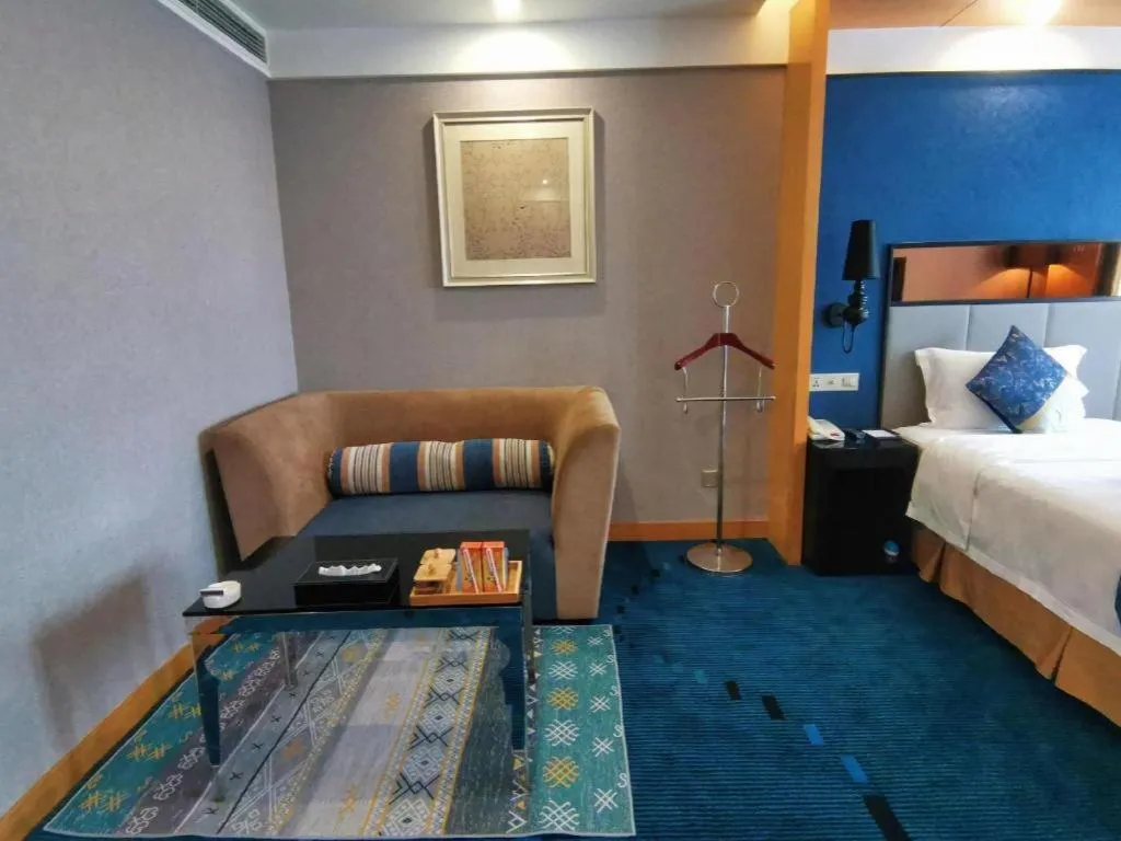 Bed in Grand Skylight Hotel KaiMei