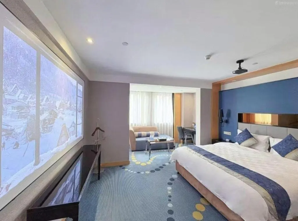 Bed in Grand Skylight Hotel KaiMei