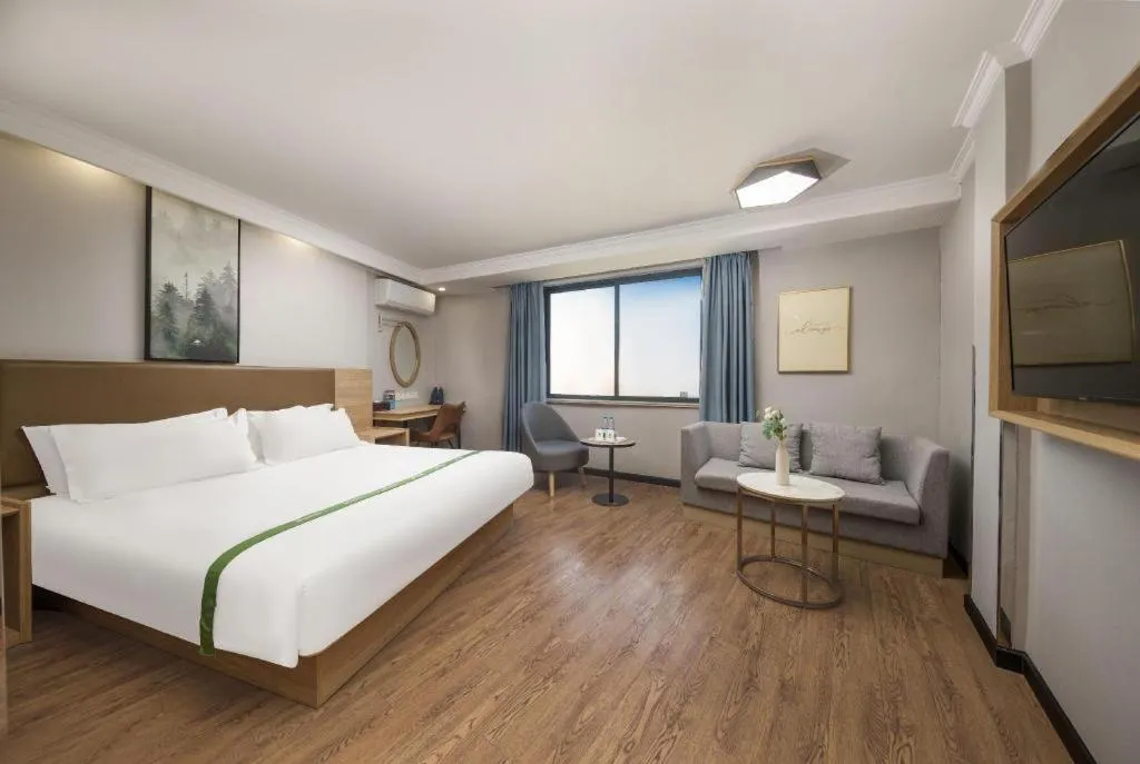 Bed in GreenTree Inn Jiaxing Tongxiang Tudian Express Hotel