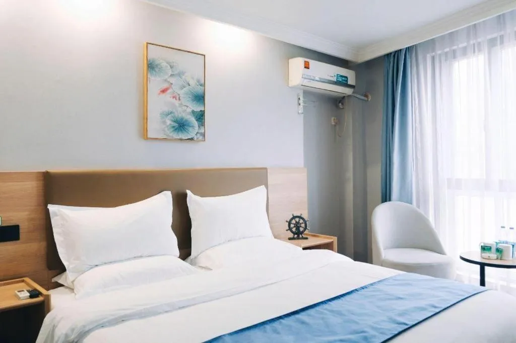 Bed in GreenTree Inn Jiaxing Tongxiang Tudian Express Hotel