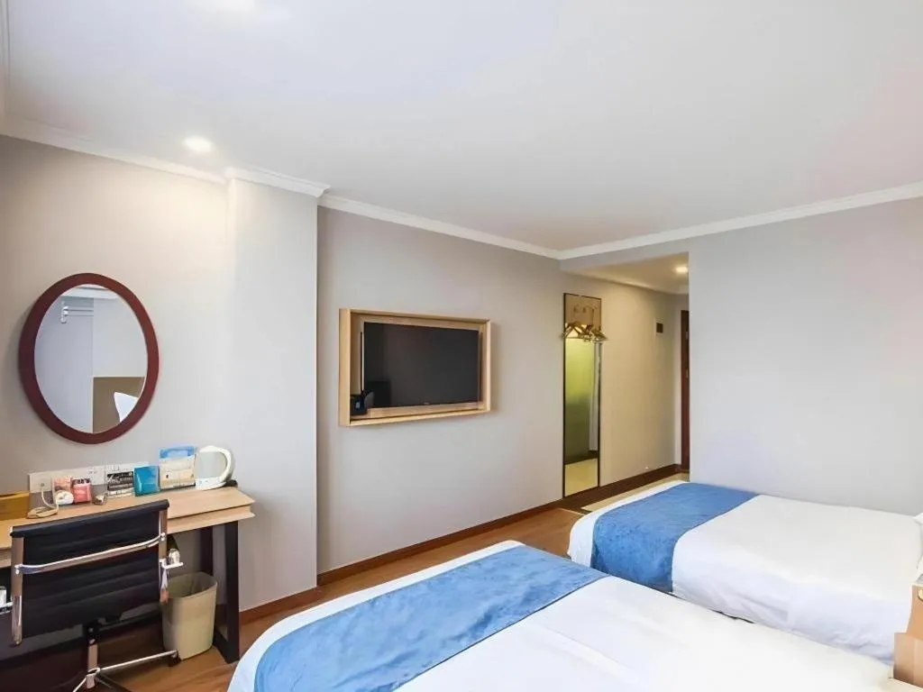 Bed in GreenTree Inn Jiaxing Tongxiang Tudian Express Hotel