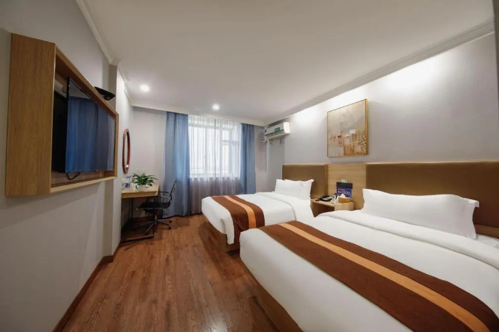 Bed in GreenTree Inn Jiaxing Tongxiang Tudian Express Hotel