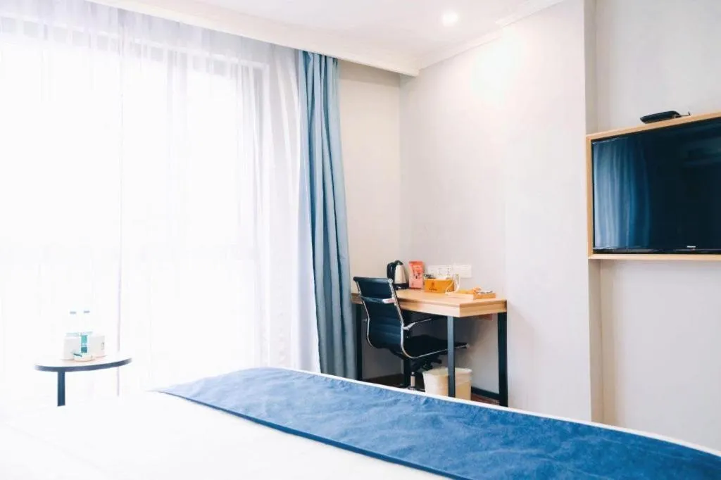 Bed in GreenTree Inn Jiaxing Tongxiang Tudian Express Hotel