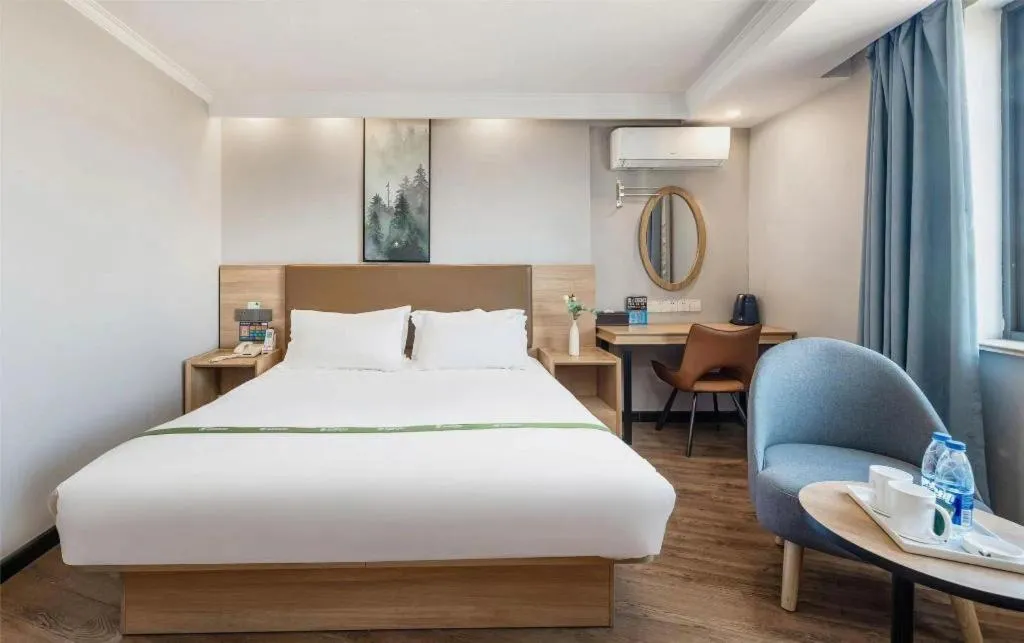 Bed in GreenTree Inn Jiaxing Tongxiang Tudian Express Hotel