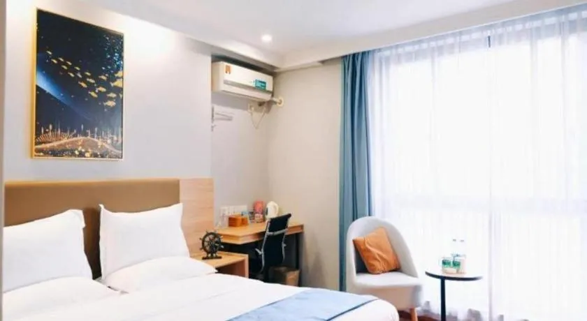 Bed in GreenTree Inn Jiaxing Tongxiang Tudian Express Hotel