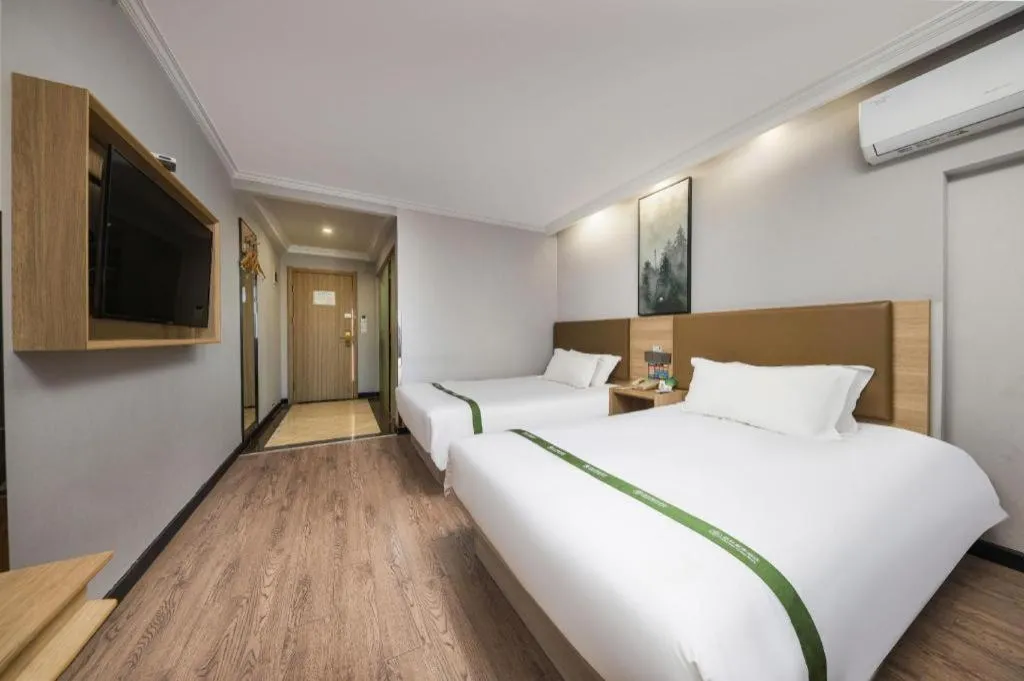 Bed in GreenTree Inn Jiaxing Tongxiang Tudian Express Hotel