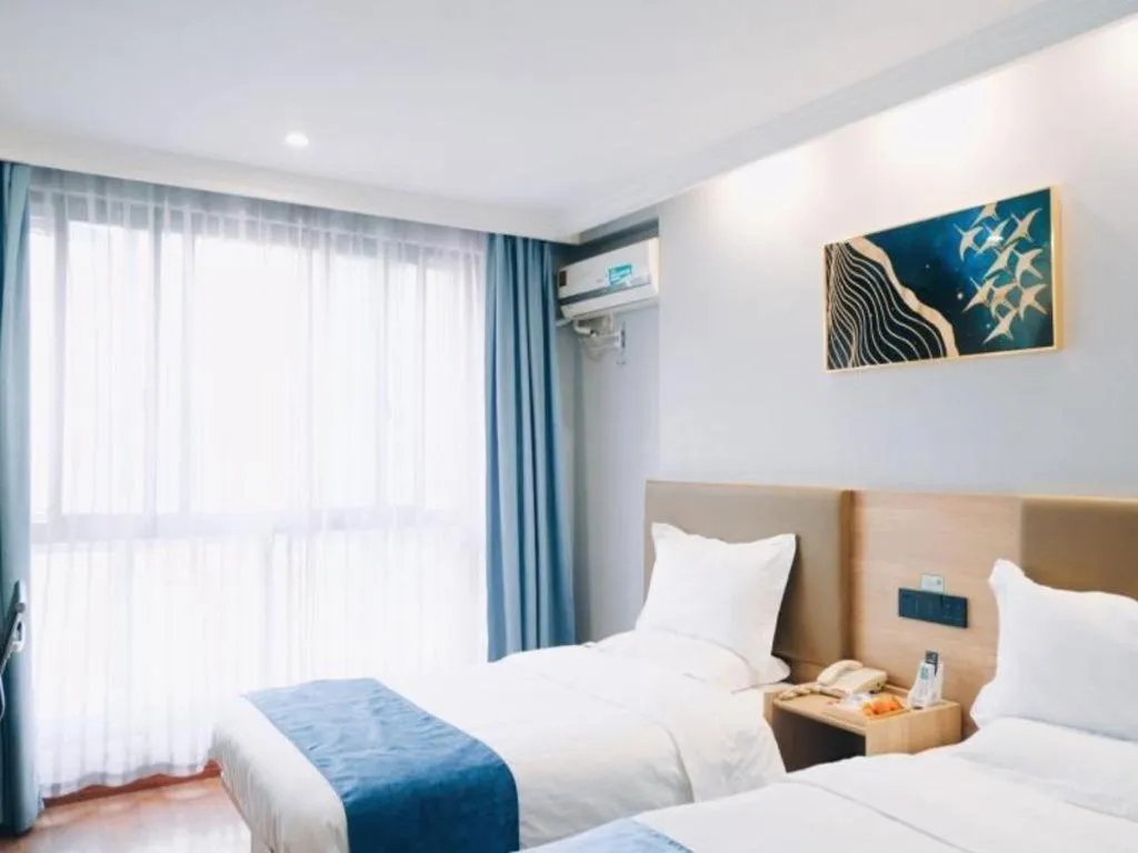 Bed in GreenTree Inn Jiaxing Tongxiang Tudian Express Hotel