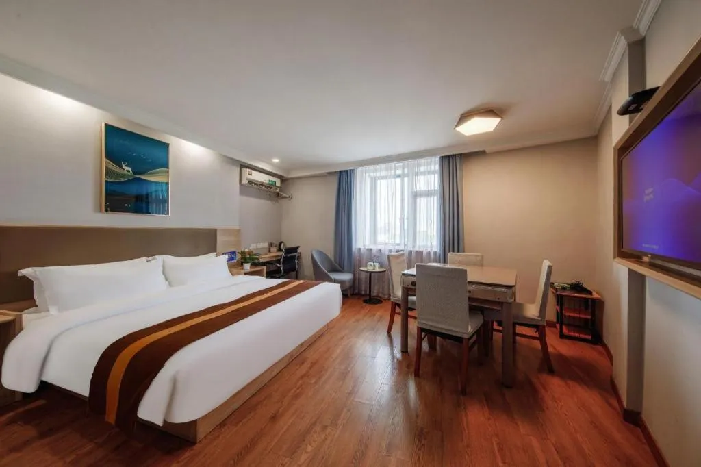 Bed in GreenTree Inn Jiaxing Tongxiang Tudian Express Hotel