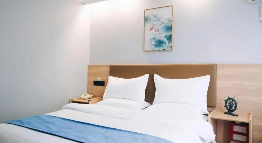 Bed in GreenTree Inn Jiaxing Tongxiang Tudian Express Hotel