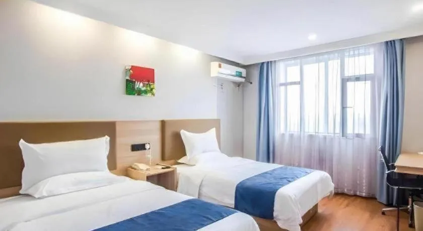 Bed in GreenTree Inn Jiaxing Tongxiang Tudian Express Hotel