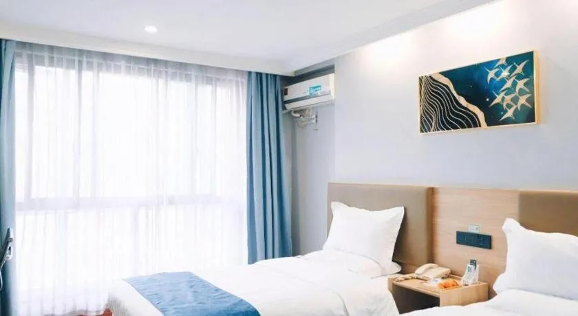 Bed in GreenTree Inn Jiaxing Tongxiang Tudian Express Hotel