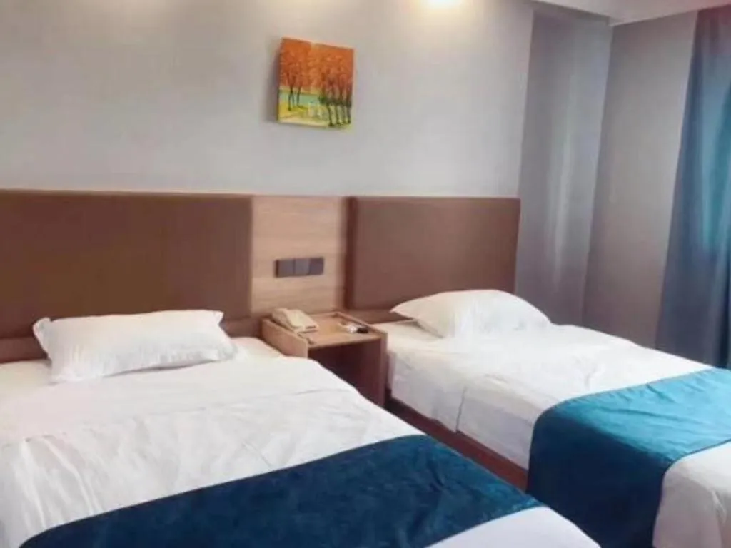 Bed in GreenTree Inn Jiaxing Tongxiang Tudian Express Hotel